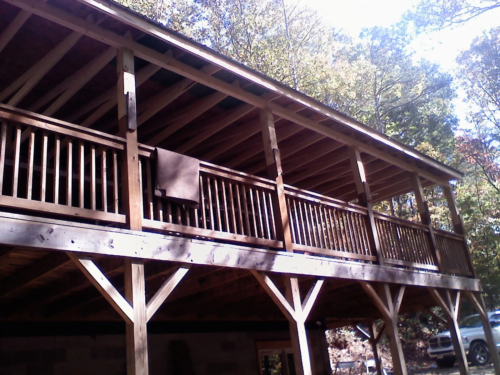 Timber framing under a new elevated porch and deck — Roof Leak Repair in Mosier by Roofing Brothers
